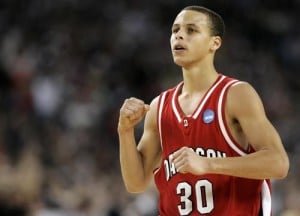 Davidson's Curry celebrates after a three-pointer against Wisconsin during their NCAA basketball game in Detroit