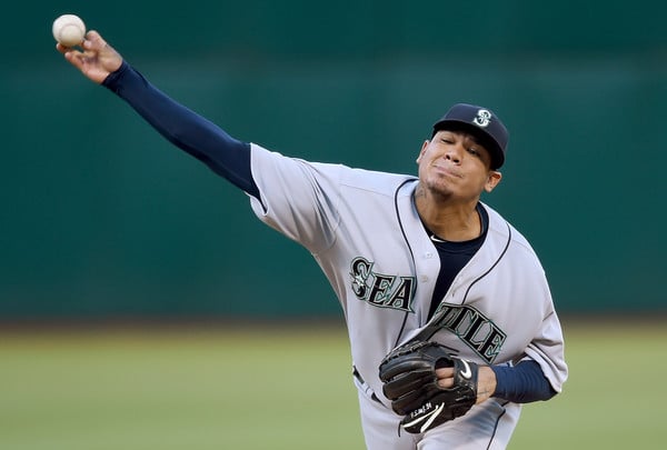 Felix Hernandez throws a pitch against the Oakland Athletics