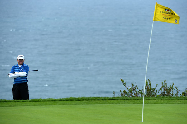 J.B. Holmes looks on at the green at the Farmers Insurance Open