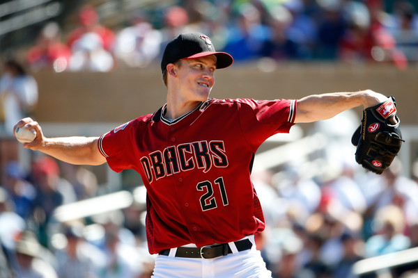 Zack Greinke throws a pitch during the second frame of the spring training match versus the Oakland Athletics
