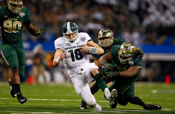 Andrew Billings helps to take down Connor Cook