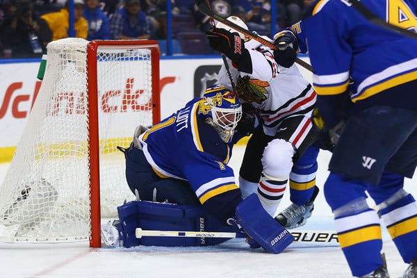 Brian Elliott makes a save against the Chicago Blackhawks in Game 1