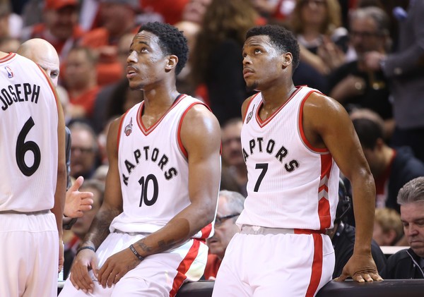 DeMar DeRozan and Kyle Lowry contemplate their loss