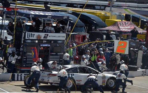 Brad Keselowski makes a pit stop at the STP 500