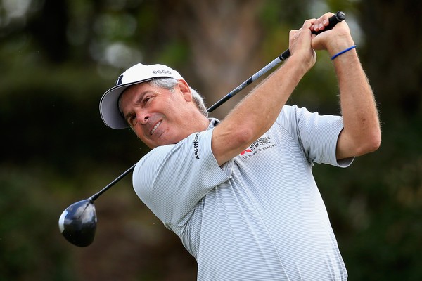 Fred Couples in a post-drive pose