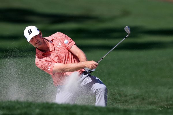 Hudson Swafford hits a bunker shot