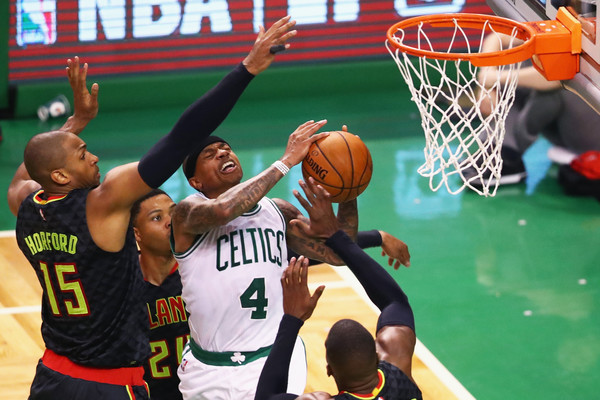 Isaiah Thomas drives to the cup against the Hawks