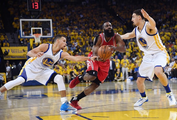 James Harden looks to get past through the Warriors' defense