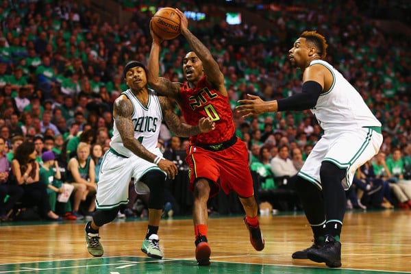 Jeff Teague forces his way into the lane