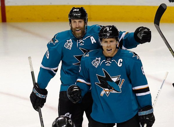 Joe Pavelski and Joe Thornton celebrate the Sharks' win against Nashville