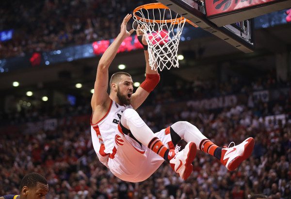 Jonas Valanciunas slams the ball home