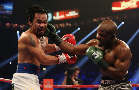 Timothy Bradley lands a right hand on Manny Pacquiao's head