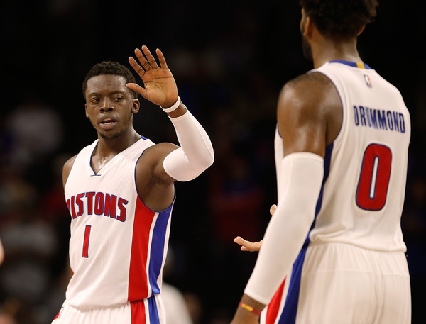 Reggie Jackson celebrates with Andre Drummond