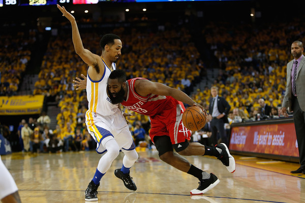 James Harden attempts to drive against Golden State's Shaun Livingston