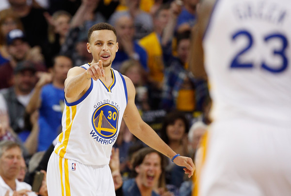 Stephen points at Draymond Green during the game versus the Portland Trail Blazers