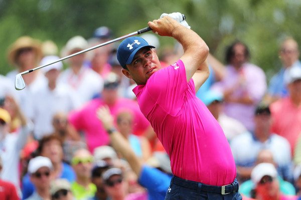 Gary Woodland watches his drive