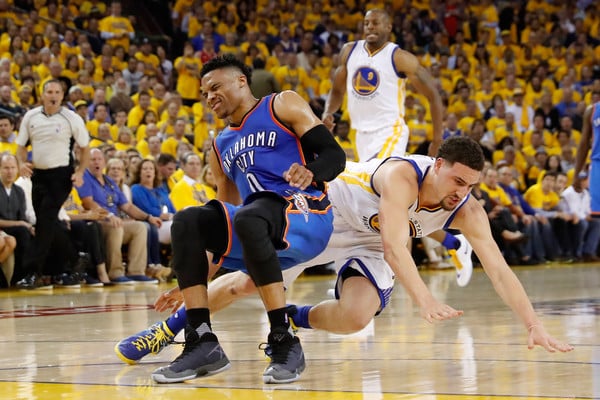 Klay Thompson collides with Russell Westbrook