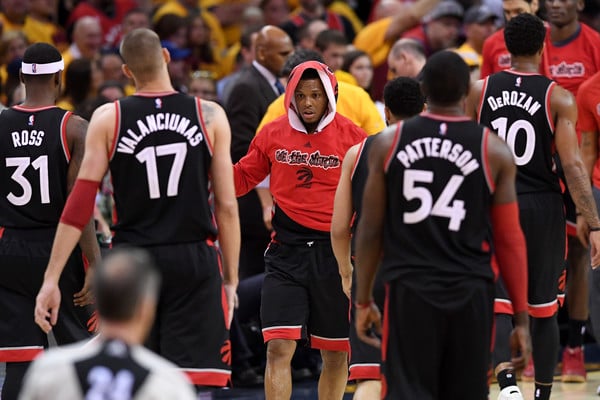 Kyle Lowry greets his teammates