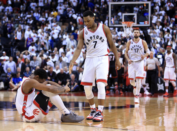 Kyle Lowry tries to help out DeMar DeRozan