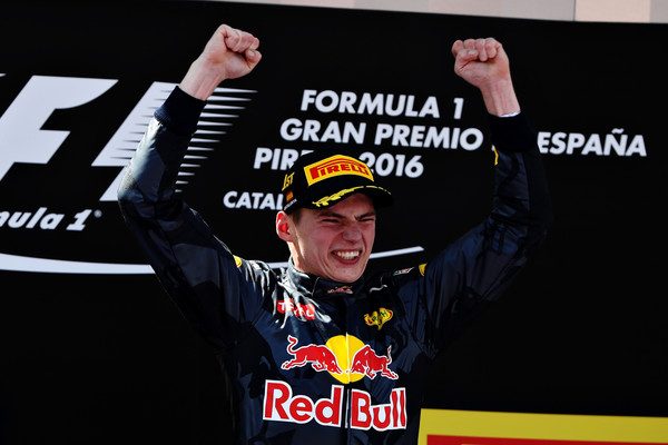 Max Verstappen celebrates his first Grand Prix win
