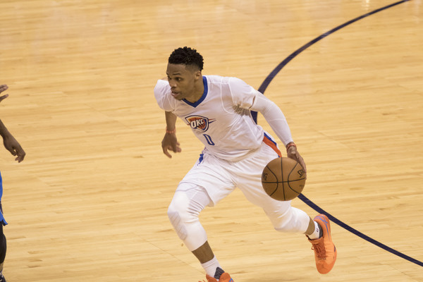 Russell Westbrook brings the ball down