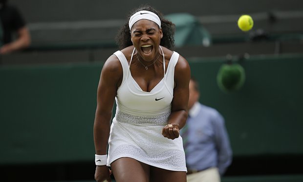 Serena Williams roars after winning a set
