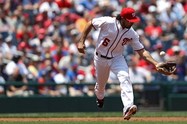 Anthony Rendon fields a ball