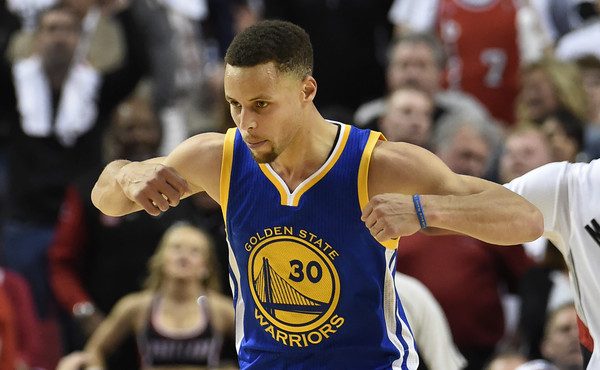 Stephen Curry celebrates the win