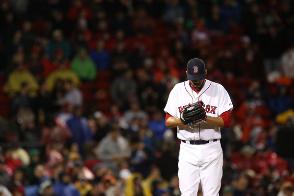 David Price reacts after giving up three runs in an inning