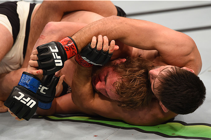 Demian Maia attempts a rear naked choke on Gunnar Nelson