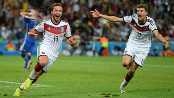 Mario Gotze celebrating with Thomas Muller