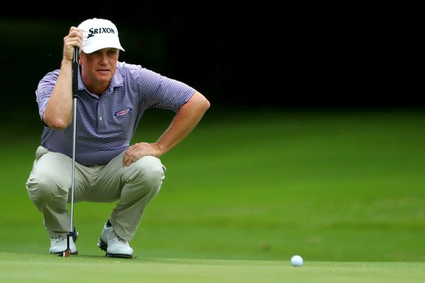 David Toms lines up a putt