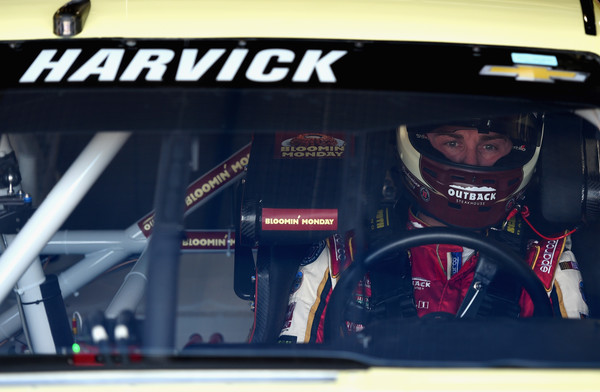 Kevin Harvick sitting in his car in the FireKeepers Casino 400