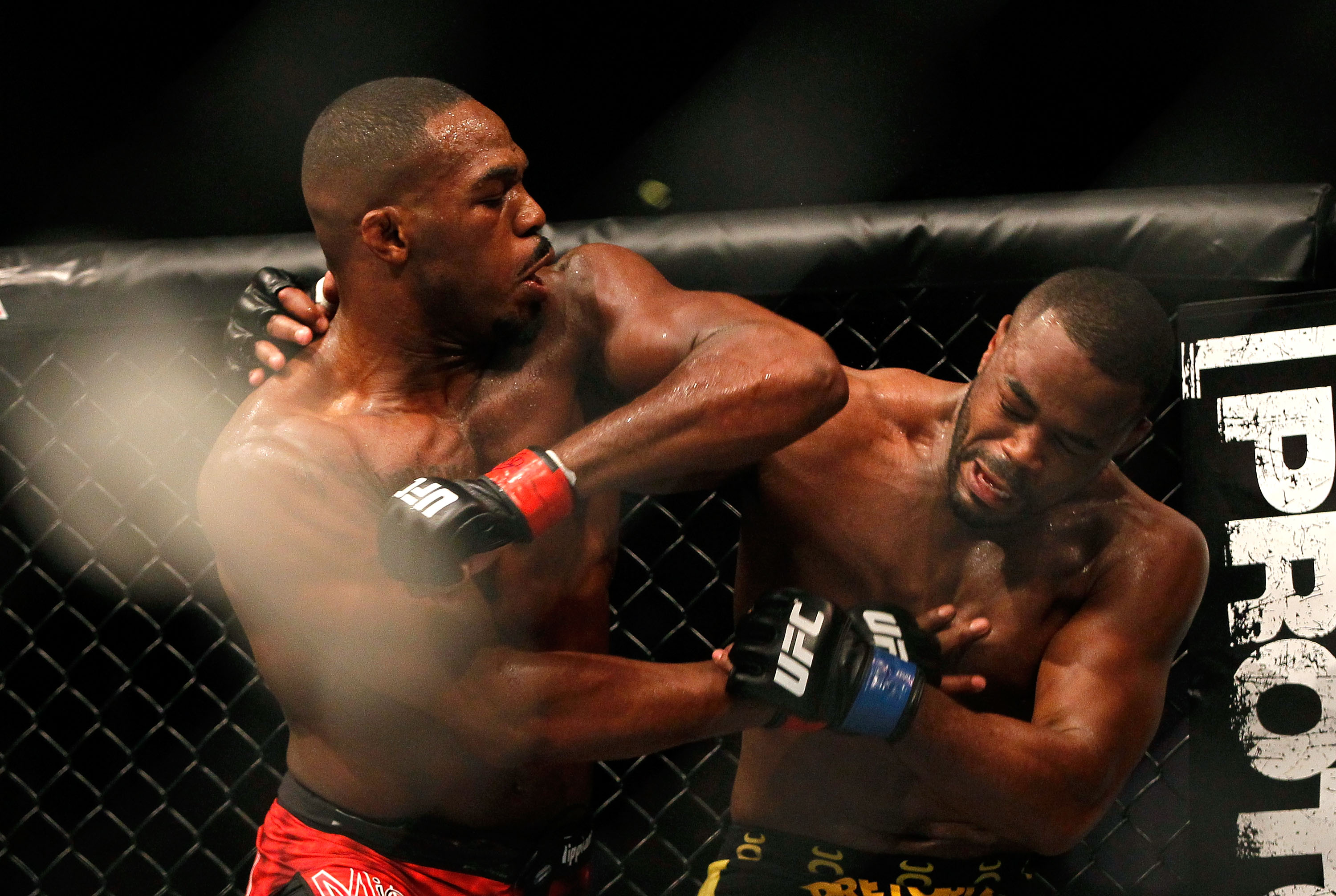 Jon Jones lands a left elbow on Rashad Evans in their championship fight