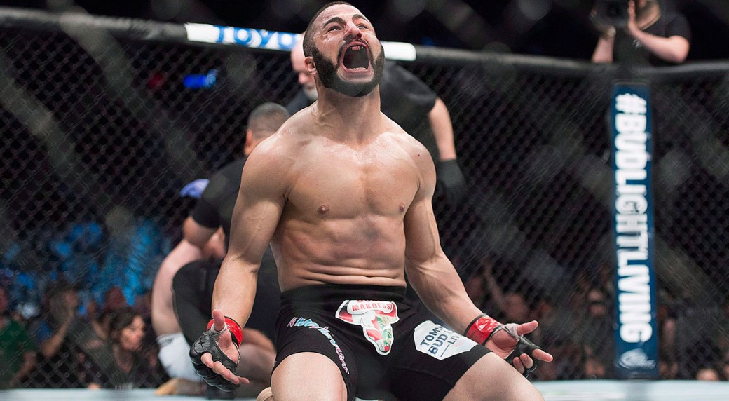 John Makdessi celebrates after knocking out Shane Campbell