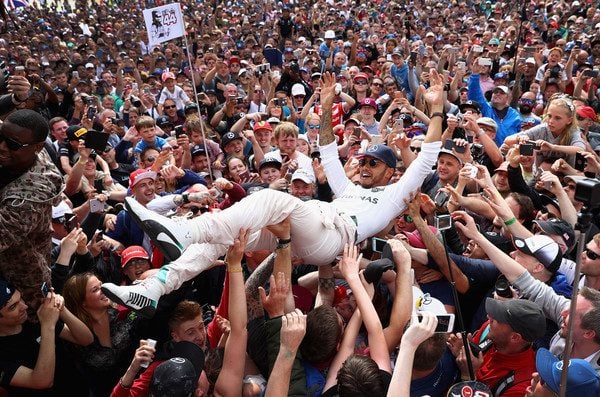Lewis Hamilton celebrates his British GP win