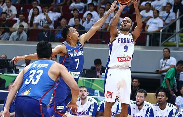 Tony Parker takes the baseline jumper over Jason Castro of Gilas Pilipinas