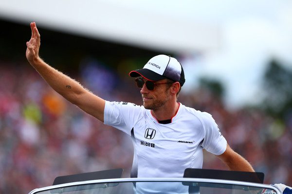 Jenson Button waves to the German crowd