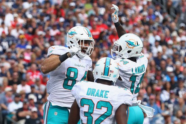 Miami Dolphins players celebrating
