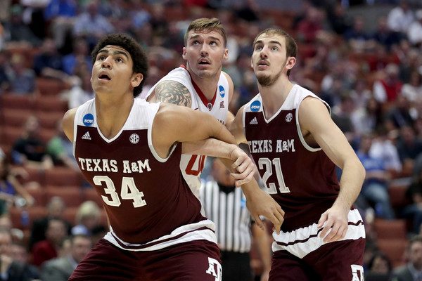 Tyler Davis goes for the rebound